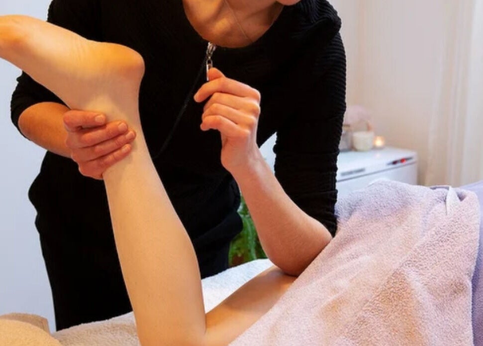 Expert leg massage at Caring For You Treatments in Salwayash, England, GB promotes relaxation and wellness.