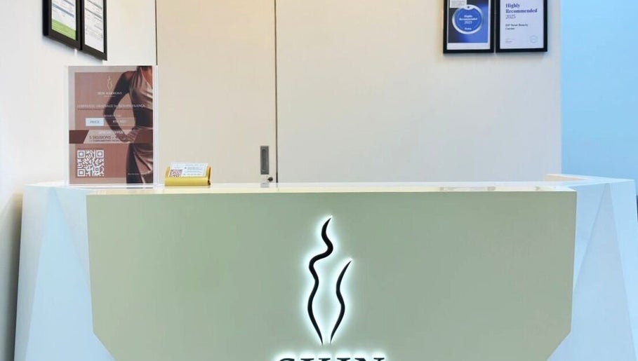 Reception area at Skin Harmony Beauty Salon, Dubai, Dubai, AE, showcasing sleek modern design and welcoming vibe.