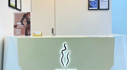 Reception area at Skin Harmony Beauty Salon, Dubai, Dubai, AE, showcasing sleek modern design and welcoming vibe.