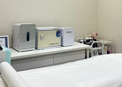 Modern treatment room at Skin Harmony Beauty Salon, Dubai, Dubai, AE, featuring advanced wellness equipment.