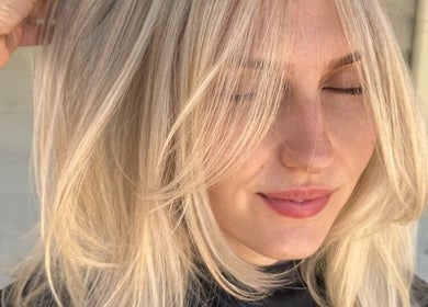 Blonde hairstyle at Hair by Denielle, Kedron, Queensland, AU showcases vibrant and elegant hair design.