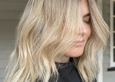 Elegant blonde hairstyle at Hair by Denielle, Kedron, Queensland, AU.