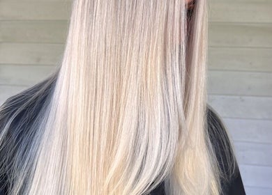 Sleek, platinum blonde hair styled at Hair by Denielle in Kedron, Queensland, AU.