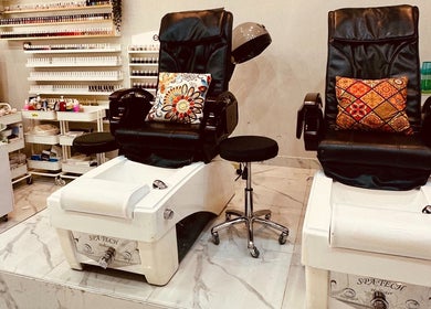 Pedicure chairs at Golden Lotus Beauty Salon, Sharjah, AE, ready for a luxurious pampering session.