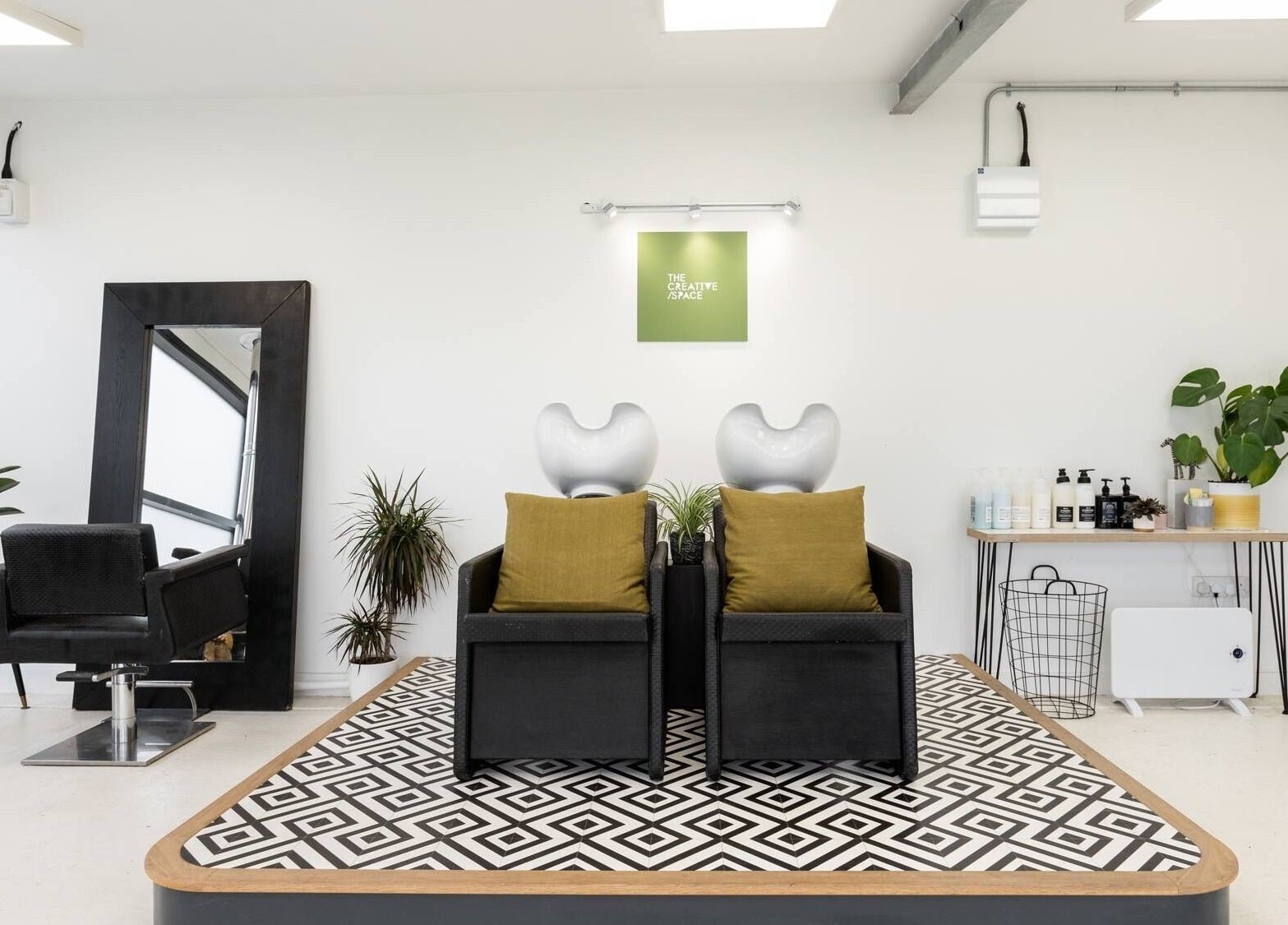 Modern salon interior at Hayley Edwards, Creative Space Kent, Faversham, England, GB with stylish chairs and decor.