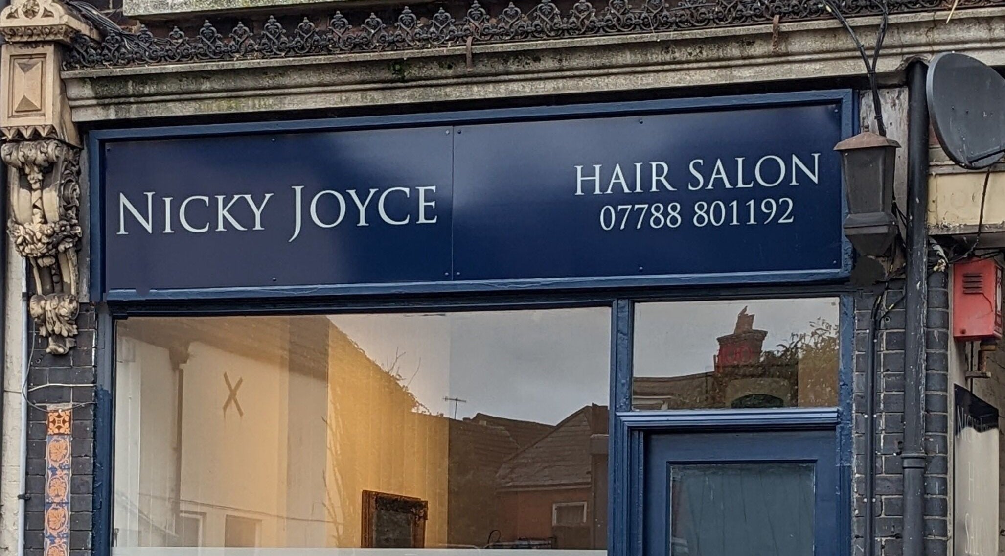 Nicky Joyce Hair Salon front in Salisbury, England, GB with elegant exterior design.
