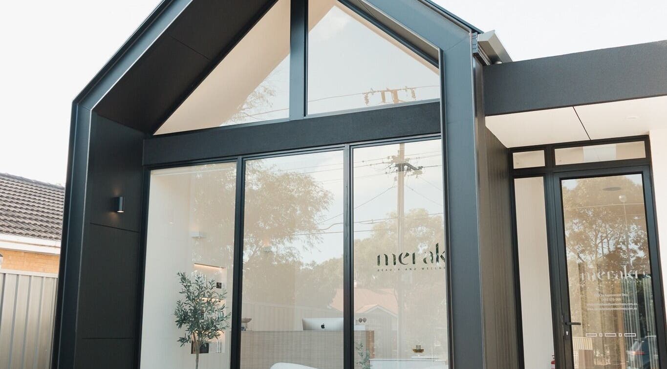 Elegant entrance of Meraki Beauty and Wellness in Paradise, South Australia, AU with modern glass design.