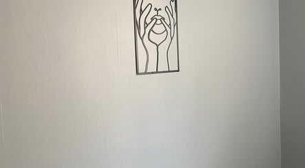 Minimalist artistic metal wall art at Lashes by Sisi, Montréal, Québec, CA.