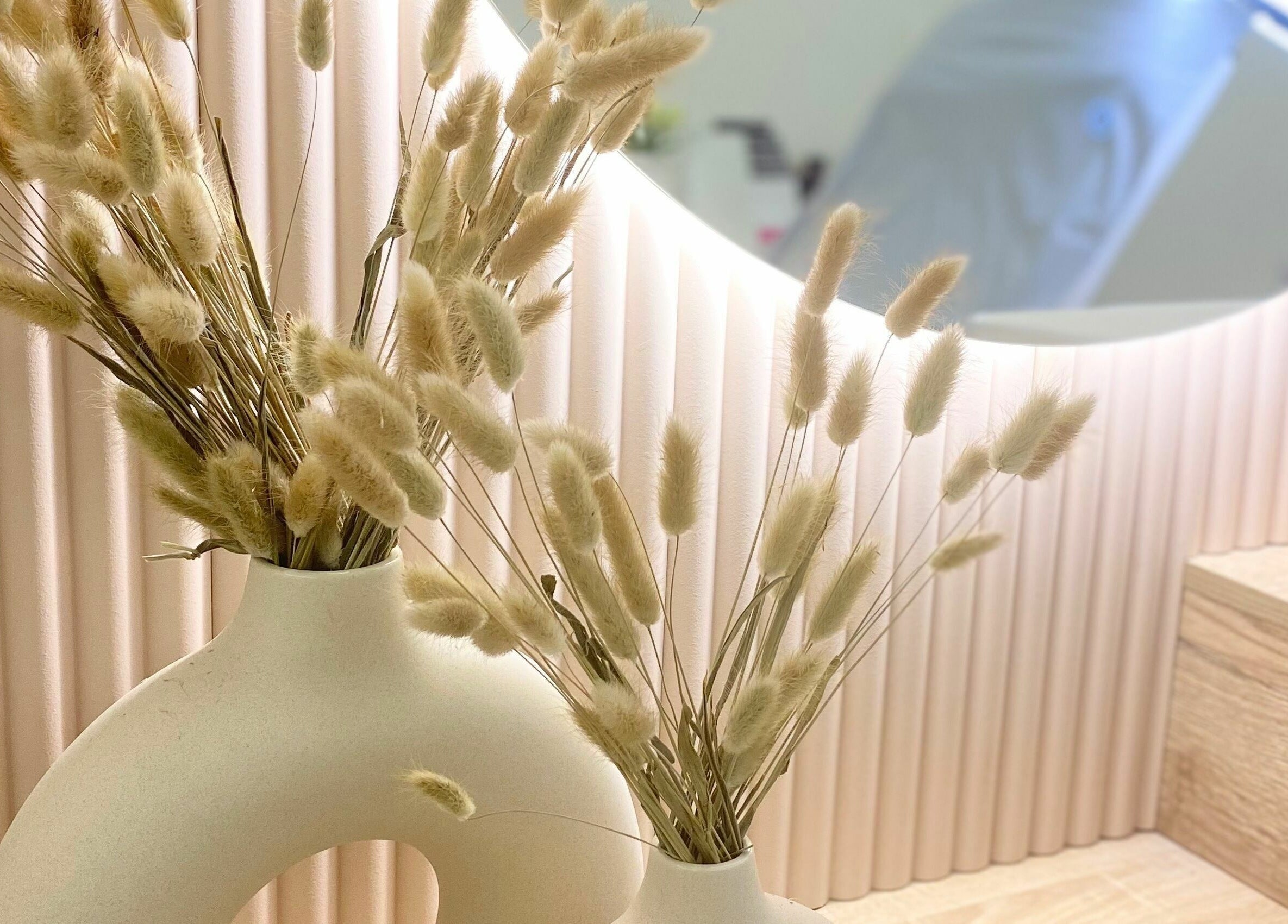 Elegant vase with dried flowers at Lulu Ink Permanent Makeup and Aesthetics - Buckingham, Bucks, England, GB.