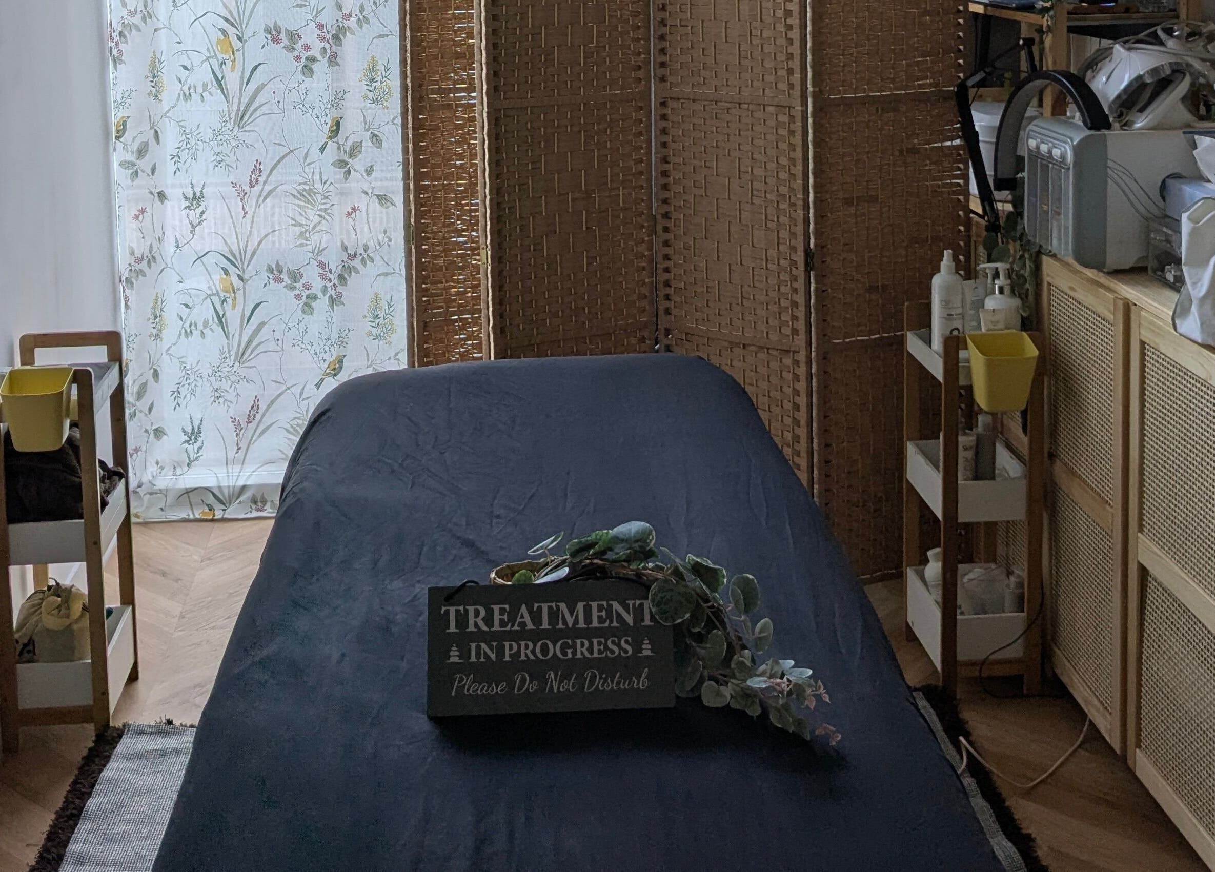 Relaxing treatment room at Indulge Pamper Relax-The Pamper room, London, England, GB with soothing decor.