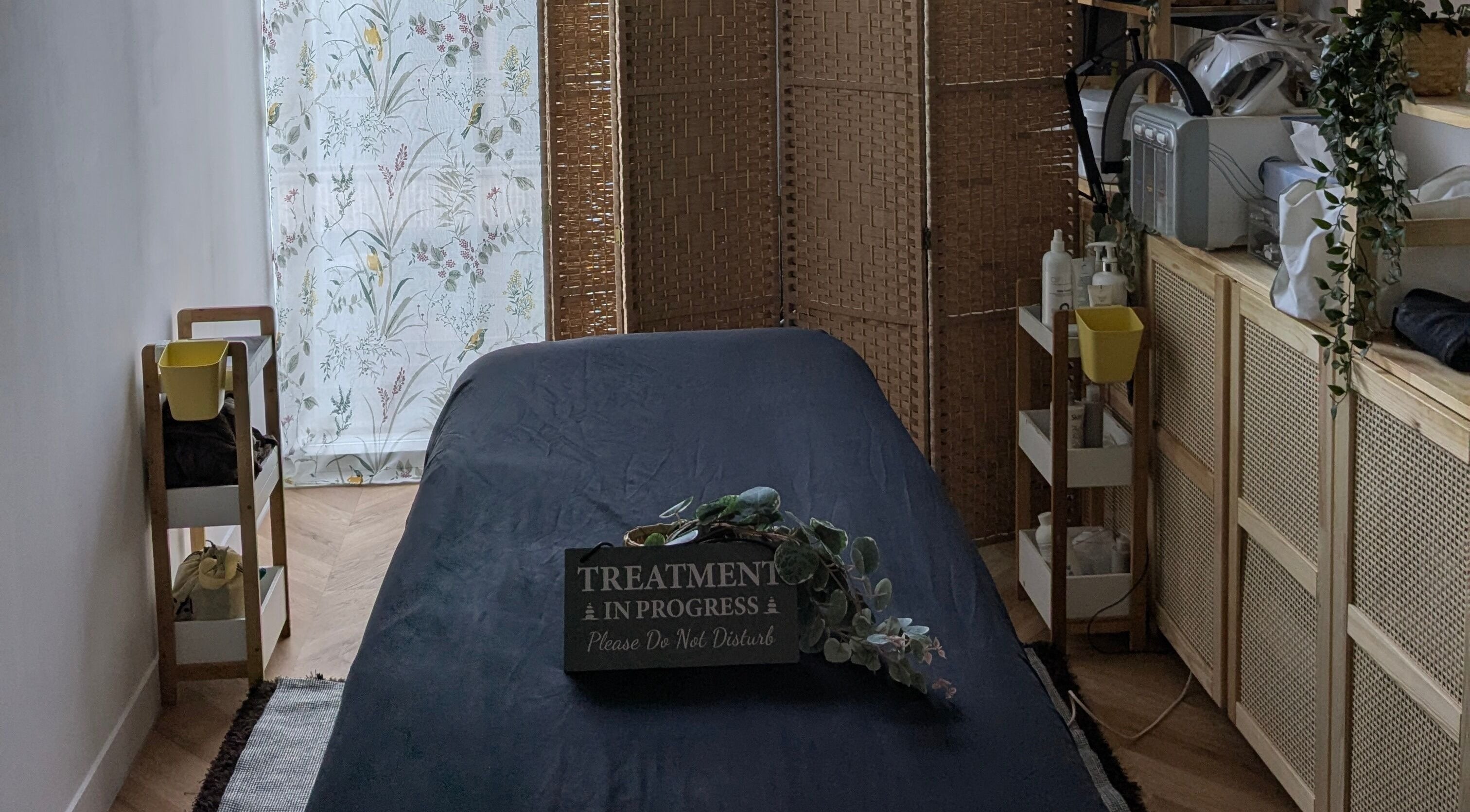 Relaxing treatment room at Indulge Pamper Relax-The Pamper room, London, England, GB with soothing decor.