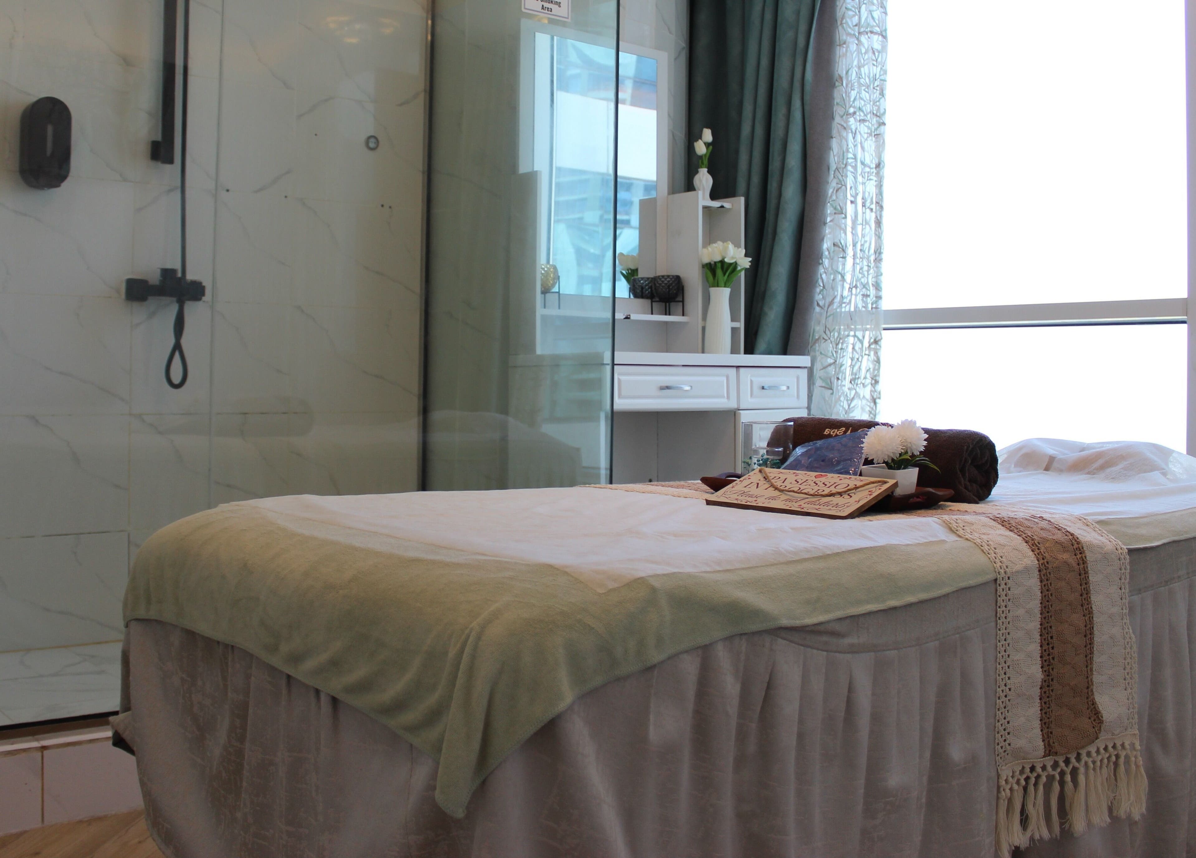 Tranquil massage room at Allora Spa and Massage Centre Dubai, Dubai, Dubai, AE, perfect for relaxation.