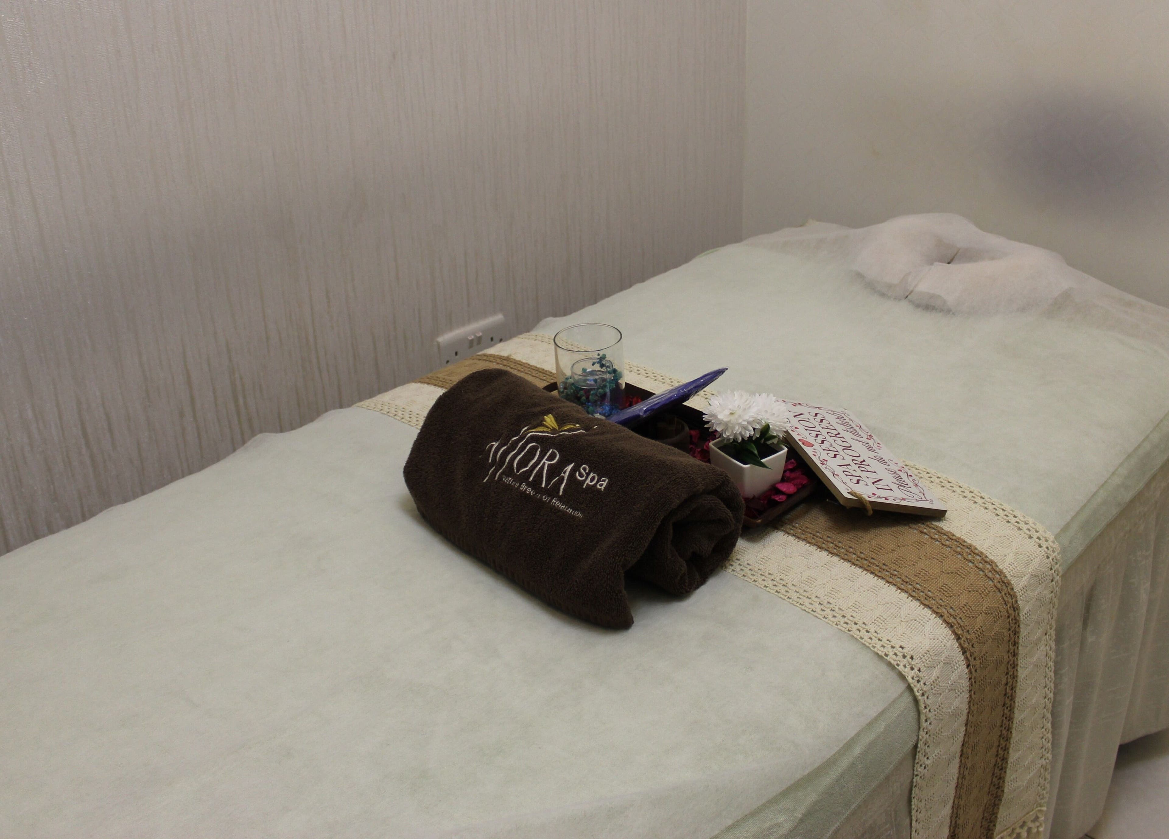 Relaxing massage bed setup at Allora Spa and Massage Centre Dubai, located in Dubai, Dubai, AE.