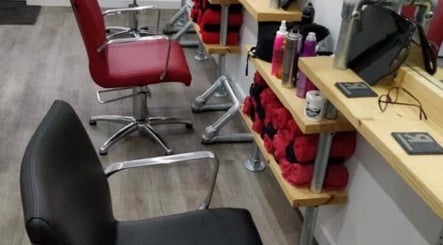 Stylish salon chairs and hair products at Julie at Reflections Hair Studio, Herstmonceux, England, GB.