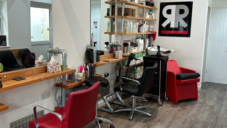Modern hair studio at Julie at Reflections Hair Studio, Herstmonceux, England, GB with styling stations and products.