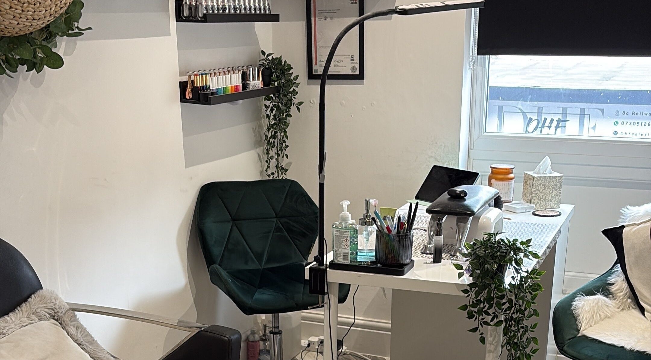 Cozy nail station at The BeautyVix at Salon V, Leigh, England, GB. Elegant chair and manicure tools visible.