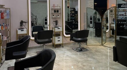 Stylish salon chairs and mirrors at Leen Beauty Center, Sharjah, Sharjah, AE, reflecting modern elegance.