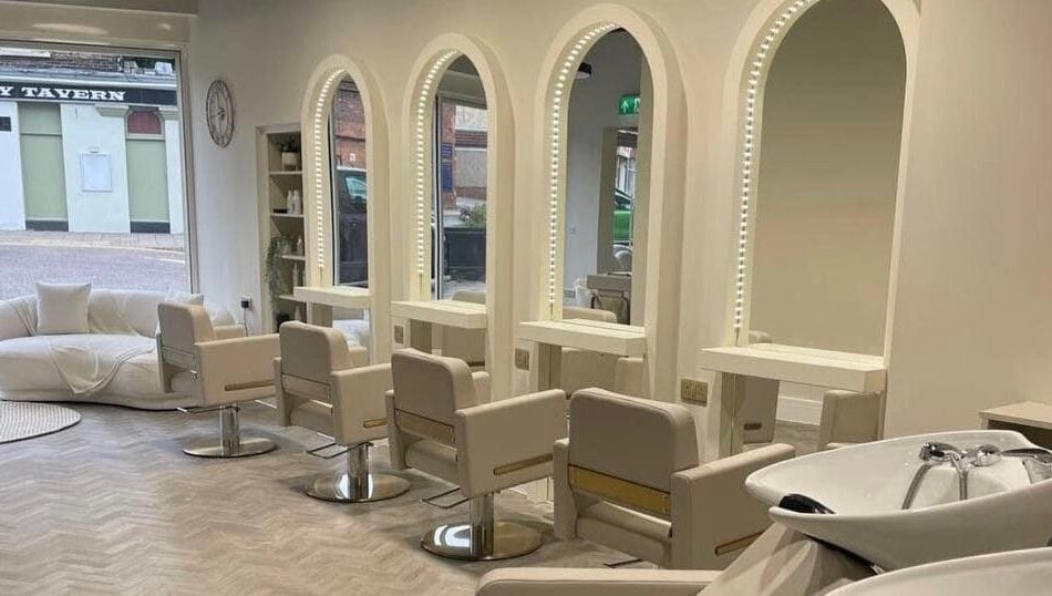 Sleek salon interior at Debut - Stanford-Le Hope, featuring mirrors and chairs. Located in Stanford le hope, England, GB.