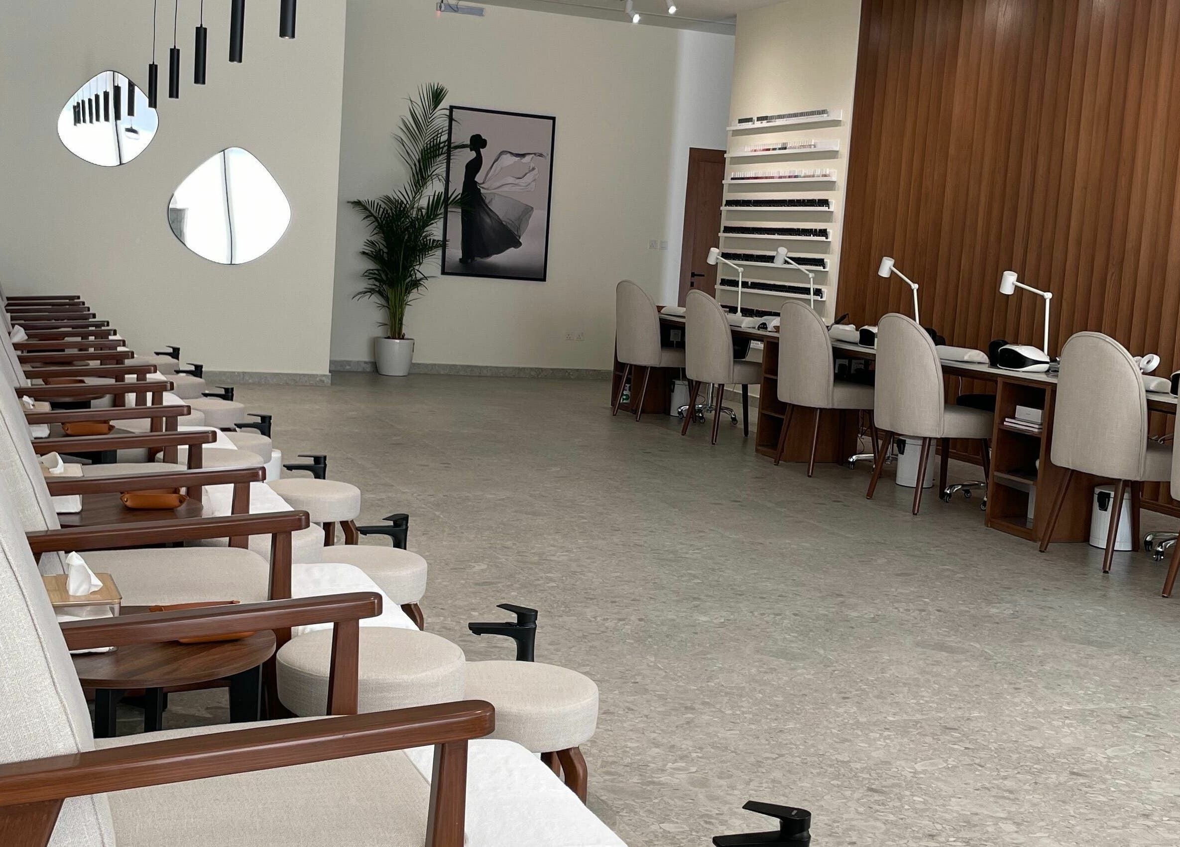 Naya Spa interior with chic manicure stations in Riyadh, Riyadh Province, SA, offering luxury wellness services.