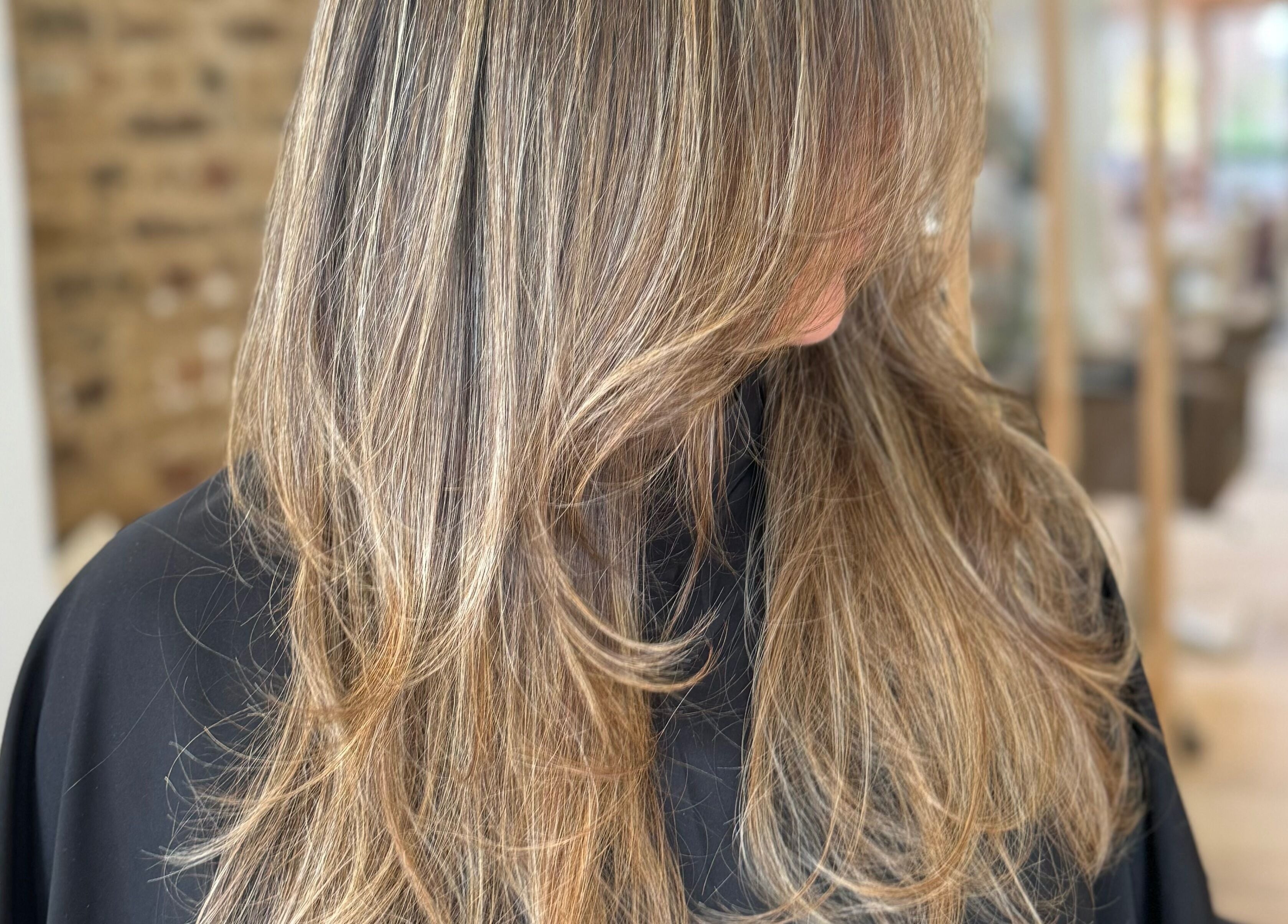 Elegant layered hairstyle at AmeliaJHair, Brighton And Hove, England, GB.