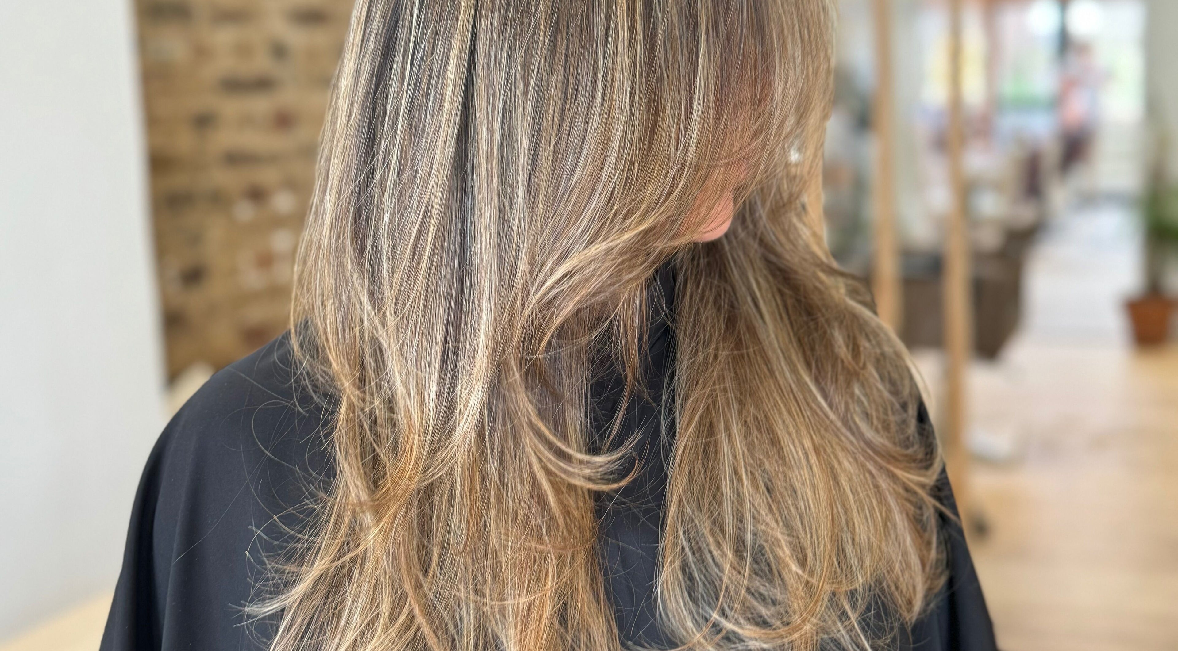 Elegant layered hairstyle at AmeliaJHair, Brighton And Hove, England, GB.