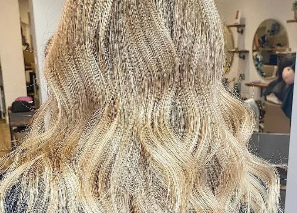 Blonde waves hairstyle at AmeliaJHair salon in Brighton And Hove, England, GB.