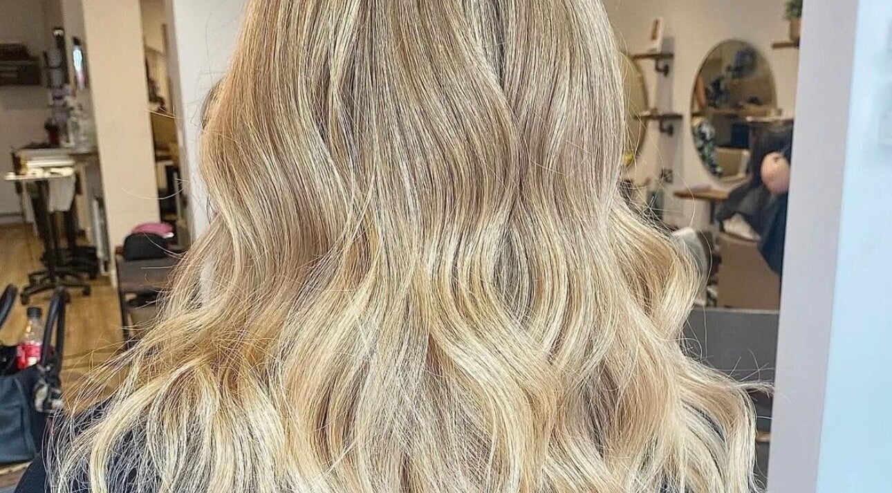 Blonde waves hairstyle at AmeliaJHair salon in Brighton And Hove, England, GB.