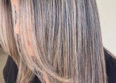 Close-up of silky straight hair at Luz Elena Alvarez, Fallbrook, California, US.