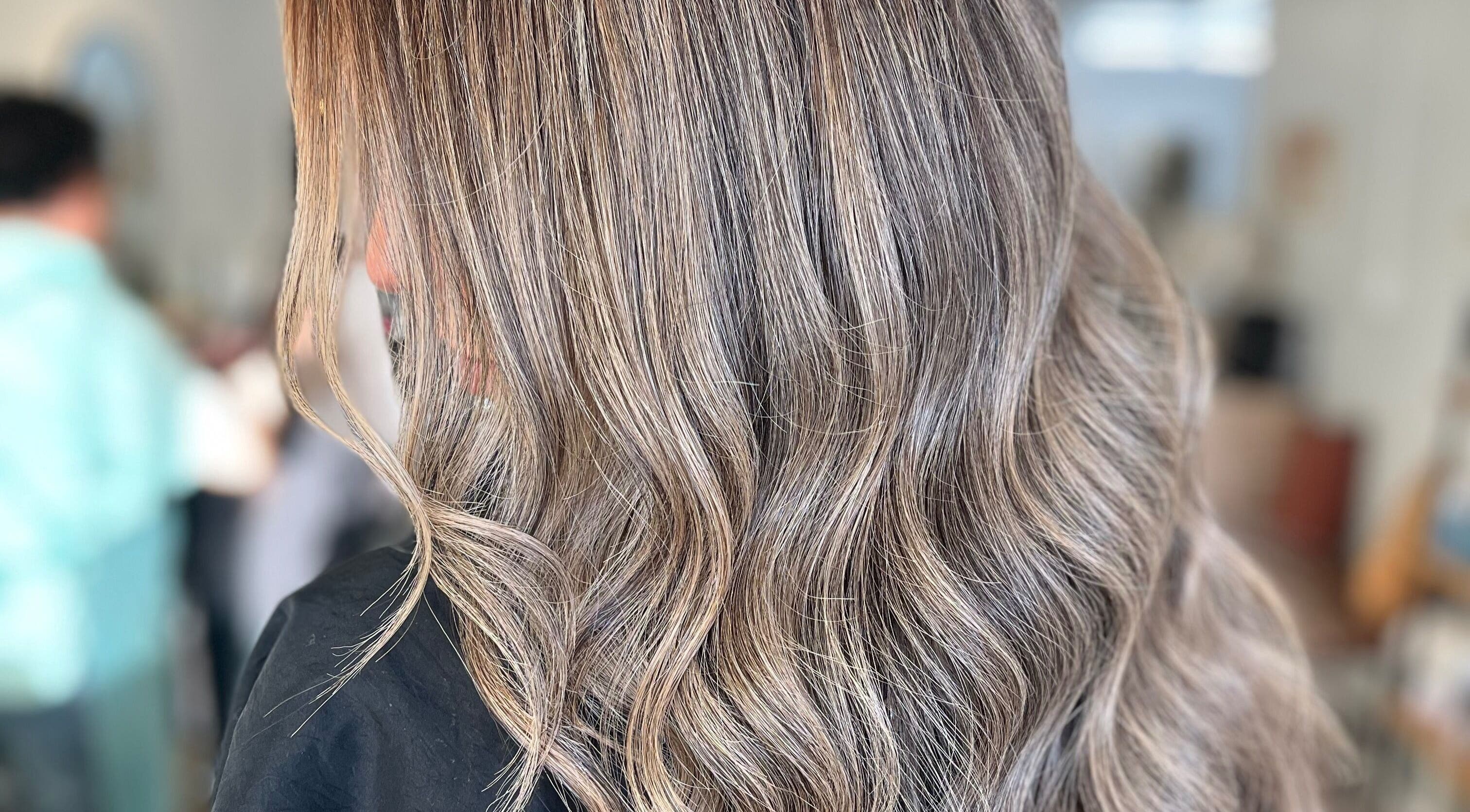 Elegant wavy hairstyle showcased at Luz Elena Alvarez, Fallbrook, California, US.