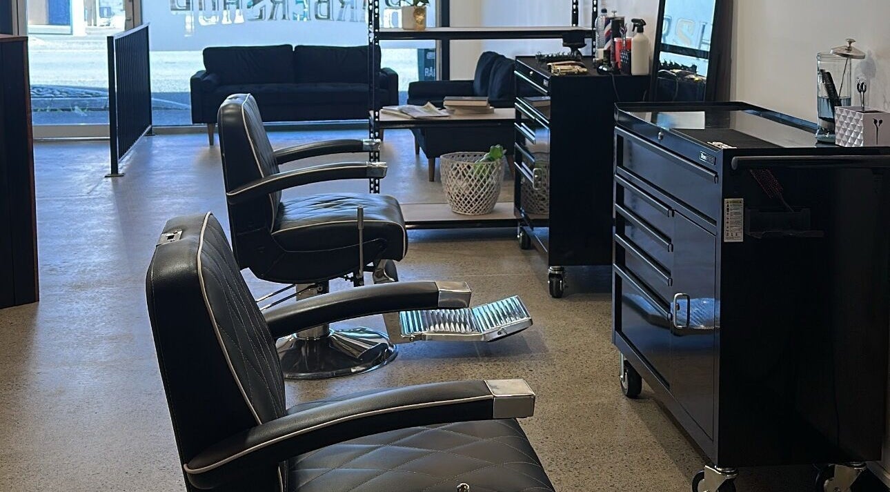 Elegant barber chairs at The Barbershop Ōtaki, Ōtaki, Wellington, NZ, showcasing a modern interior.