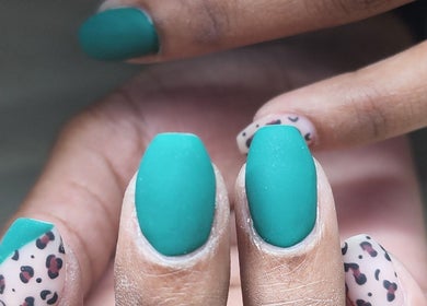 Stylish teal and leopard nail art at La Bella Vita Beauty Salon & Nail Bar, Lydenburg, Mpumalanga, ZA.