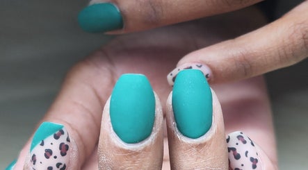 Stylish teal and leopard nail art at La Bella Vita Beauty Salon & Nail Bar, Lydenburg, Mpumalanga, ZA.