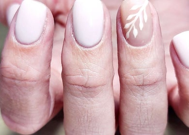 Elegant nude nail art with leaf design at La Bella Vita Beauty Salon & Nail Bar in Lydenburg, Mpumalanga, ZA.