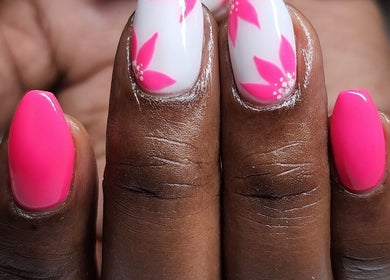 Vibrant floral pink nail art at La Bella Vita Beauty Salon & Nail Bar, Lydenburg, Mpumalanga, ZA.