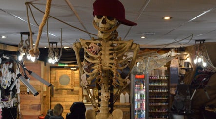 Unique skeleton decor wearing a cap in R.I Studio, a beauty venue in Cambridge, England, GB.
