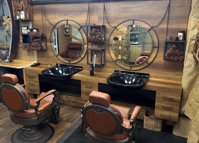 Rustic barber chairs and mirrors at R.I Studio - Hairdressers, Tattoos & Piercings, Cambridge, England, GB.
