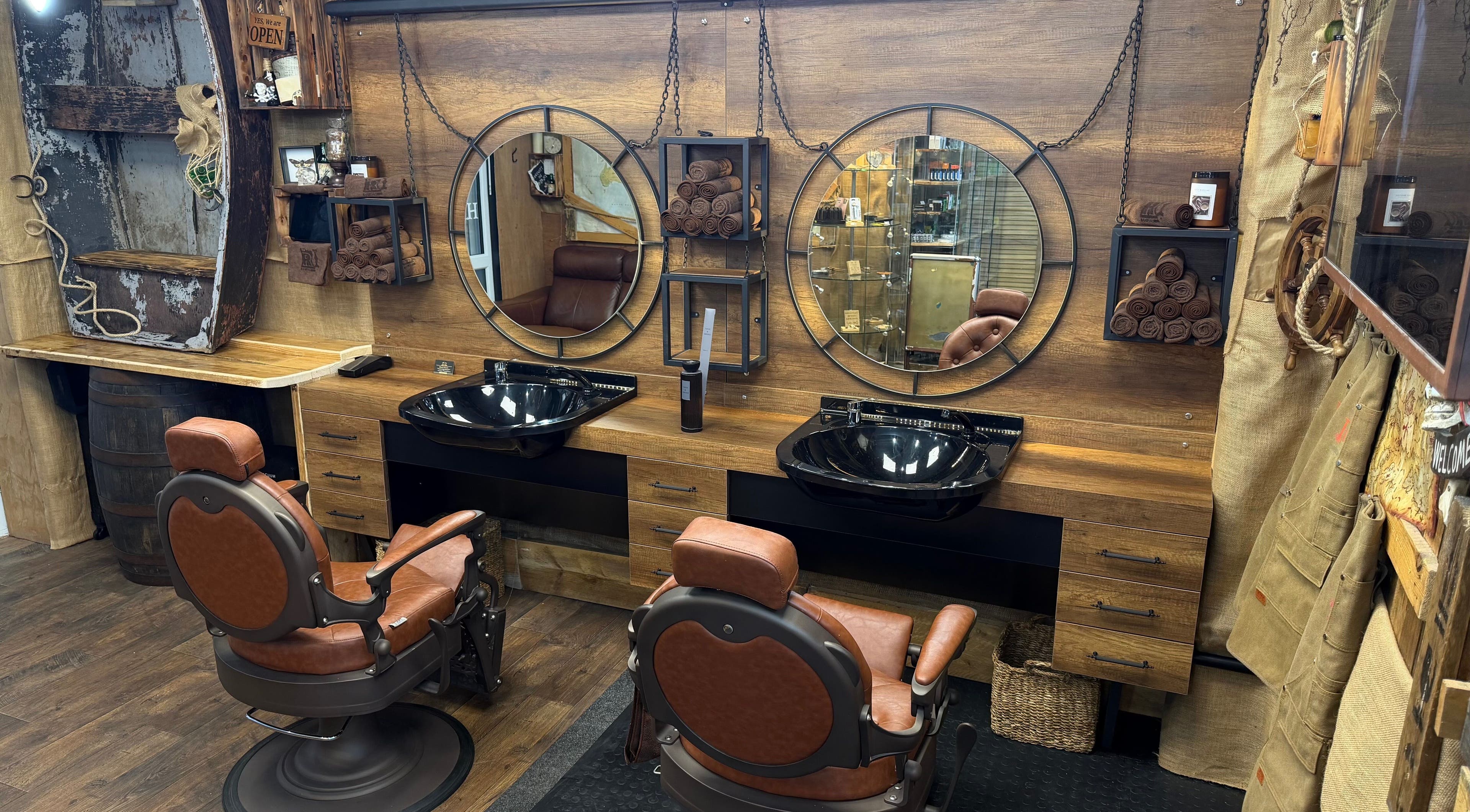 Vintage barber chairs and mirrors at R.I Studio - Hairdressers, Tattoos & Piercings, Cambridge, England, GB.