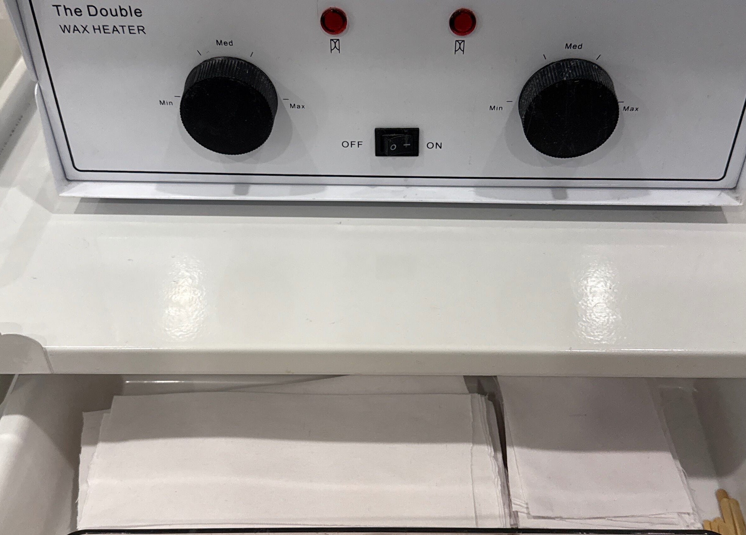 Closeup of a wax heater at Loven Beauty Inc, Vaughan, Ontario, CA, showcasing professional beauty equipment.