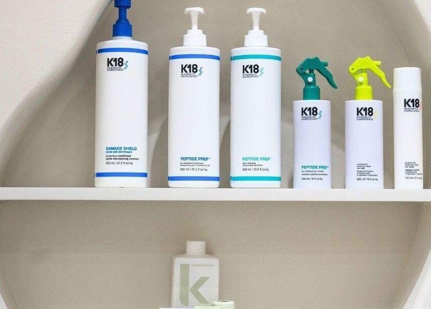 K18 hair care products on display at Clay Beauty Lounge - Mushrif, Abu Dhabi, Abu Dhabi, AE.