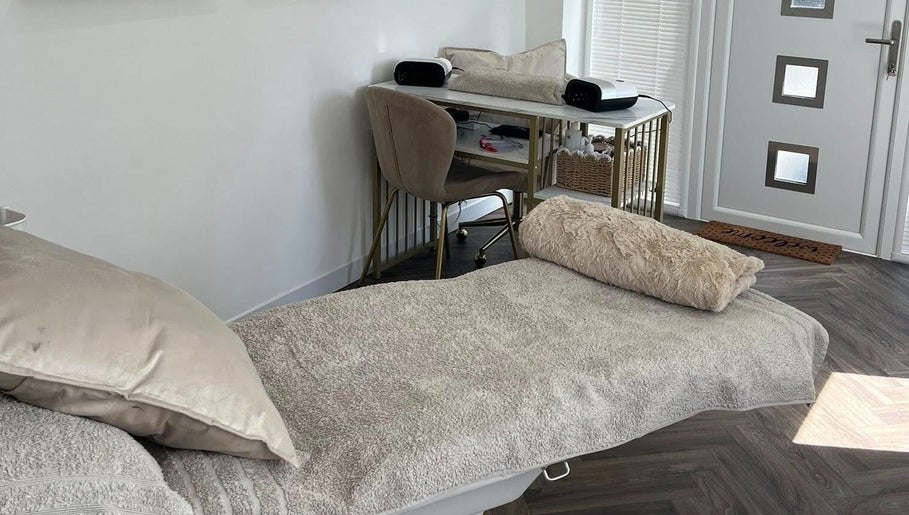 Luxurious treatment room at Chelle's Beauty, Lytham St Anne’s, England, GB, featuring a plush treatment bed.