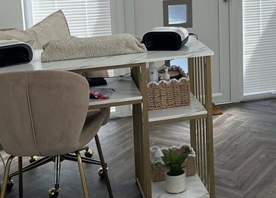 Elegant nail station at Chelle's Beauty, Lytham St Anne’s, England, GB, featuring a plush chair and chic decor.
