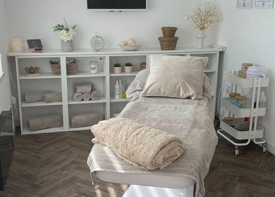 Treatment room at Chelle's Beauty, Lytham St Anne’s, England, GB with plush bedding and soothing decor.