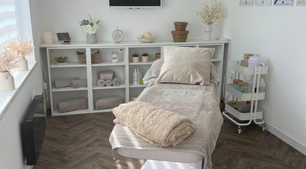 Treatment room at Chelle's Beauty, Lytham St Anne’s, England, GB with plush bedding and soothing decor.