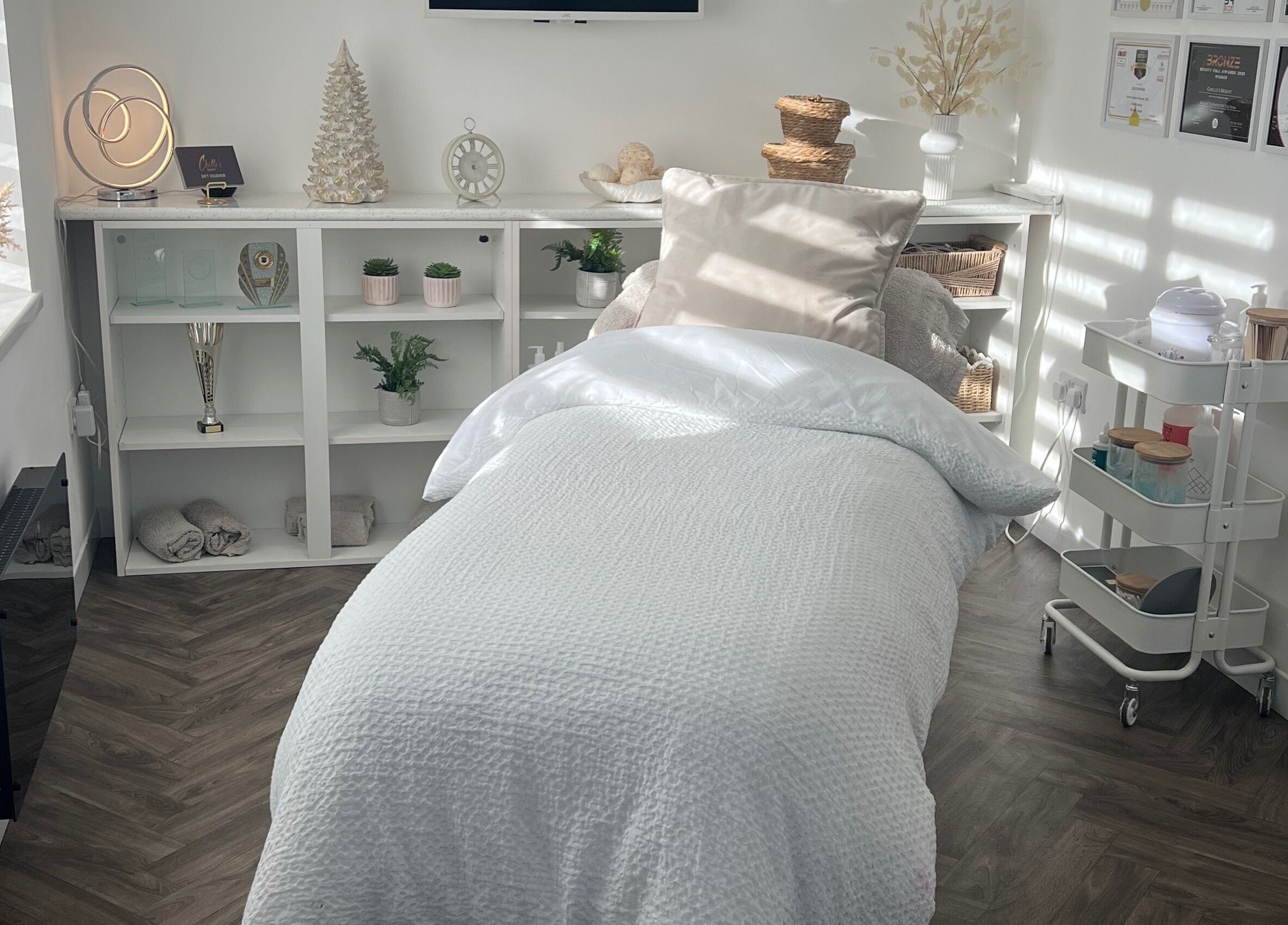 Tranquil treatment room at Chelle's Beauty, Lytham St Anne’s, England, GB, featuring a cozy bed and calming decor.