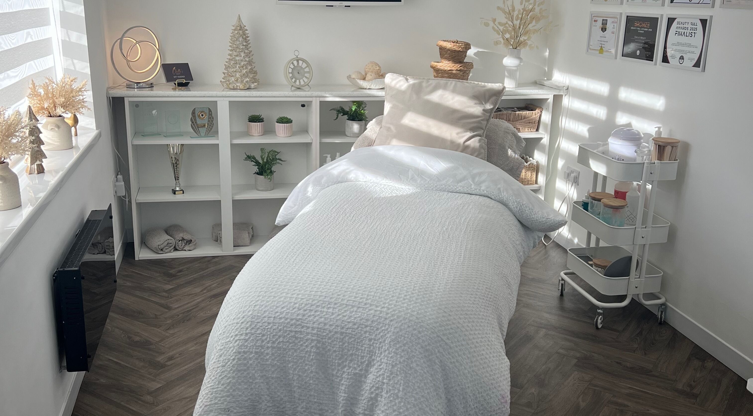 Tranquil treatment room at Chelle's Beauty, Lytham St Anne’s, England, GB, featuring a cozy bed and calming decor.