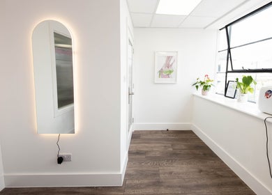 Stylish interior of Replica Beauty in London, England, GB with modern decor and natural light.