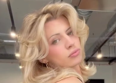 Blonde woman with stylish hairstyle at MOUR Hair, London, England, GB.