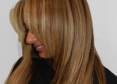 Beautifully colored hair at MOUR Hair, London, England, GB showcasing expert styling and vibrant color.