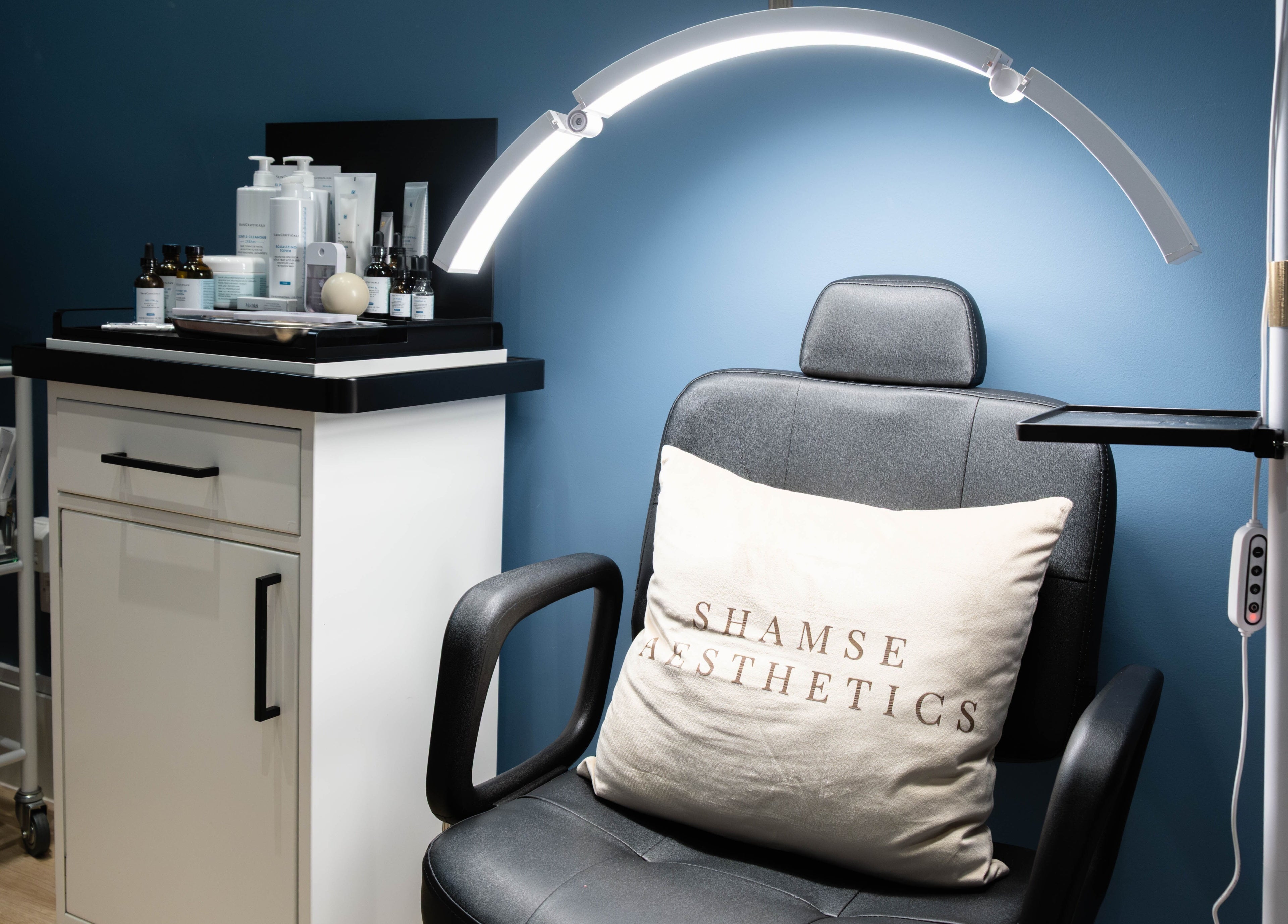 Comfortable chair and equipment in ShamseAesthetics Harley Street, London, England, GB's modern treatment room.
