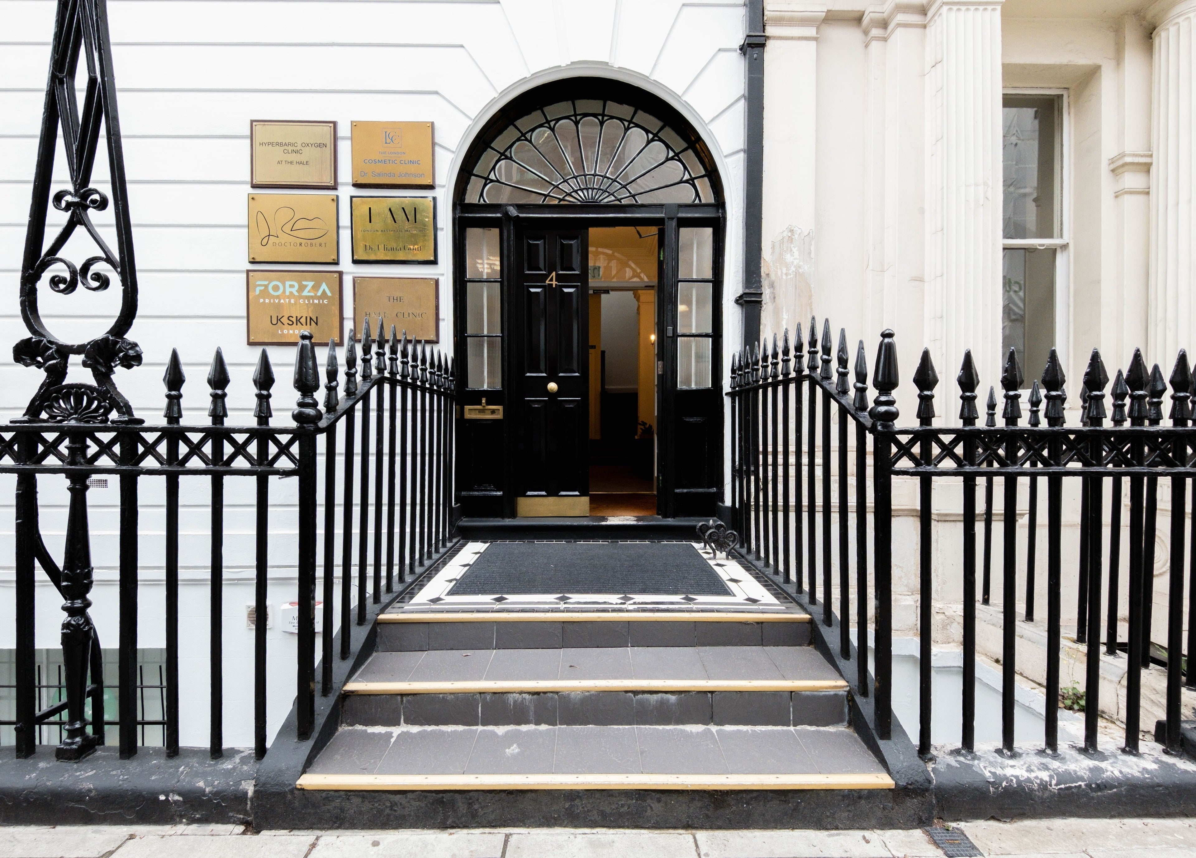 Front entrance of ShamseAesthetics Harley Street, London, England, GB, featuring classic architecture.